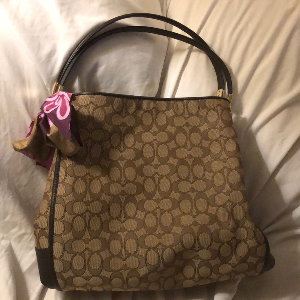 Coach brown triple section purse.